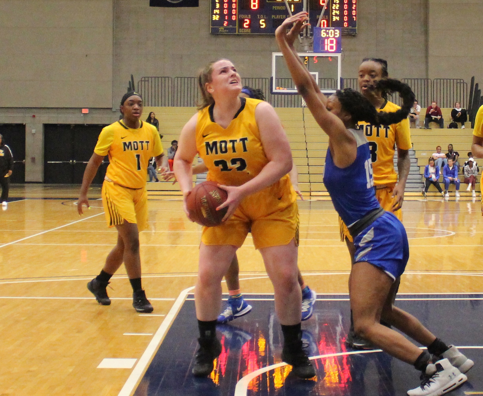 Molly Voelker of Mott CC goes up for the basket